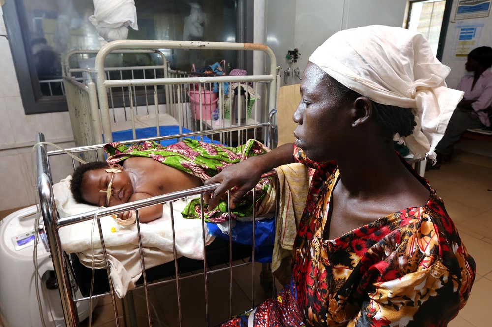 mother and baby in the hospital in Africa - social justice